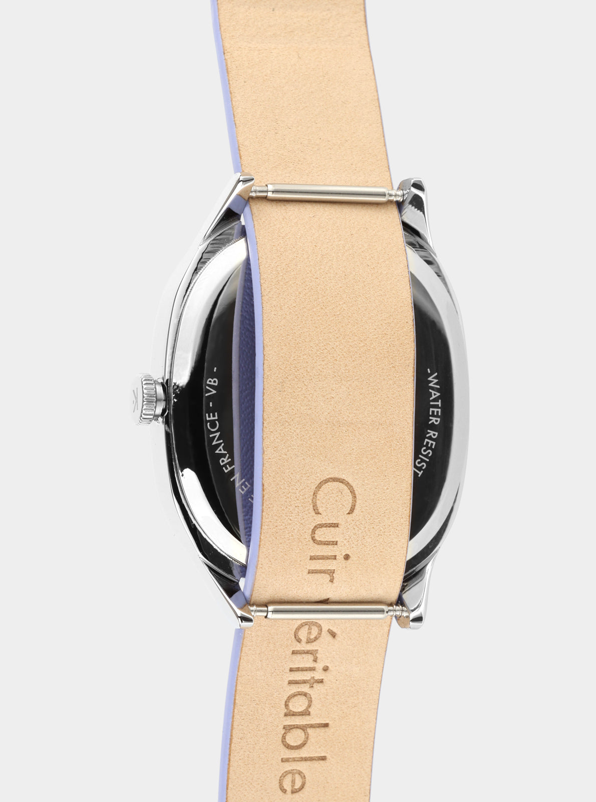 Image of Bracelet de montre en cuir beige, boucle et inscription sur la lanière.