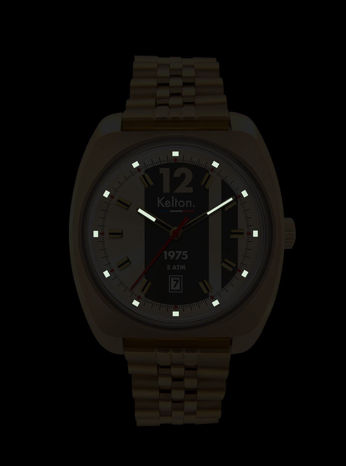Image of Montre à bracelet acier doré, cadran noir, aiguilles rouges et repère 12/1975.
