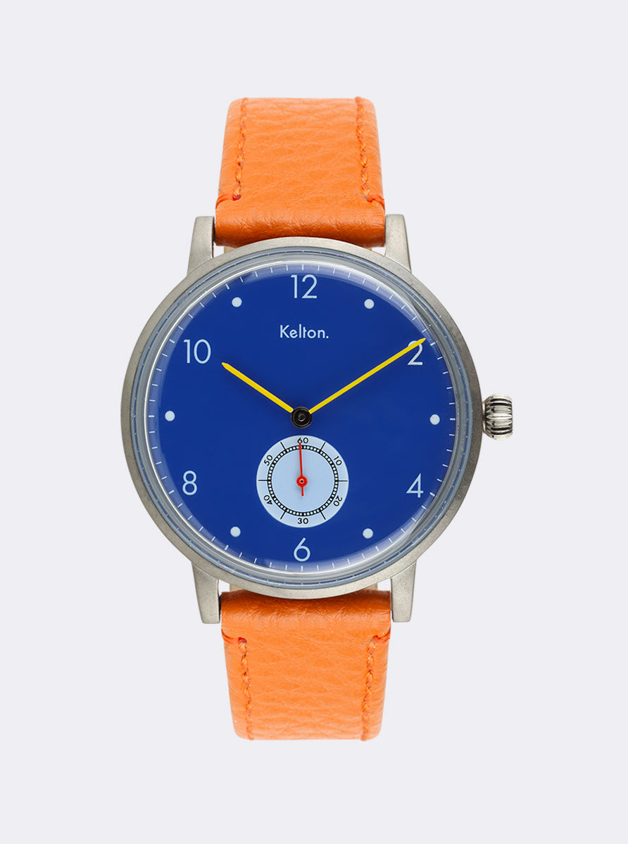 Image of Montre à cadran bleu et bracelet cuir orange, boîtier argenté