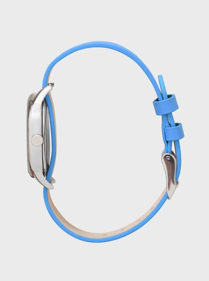 Image of Montre Colorama bleue vue de profil, bracelet bleu avec double passant.
