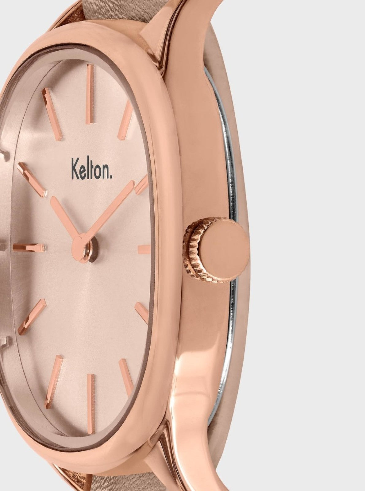 Image of Montre or rose, cadran crème, index et aiguilles orange, vue de côté.