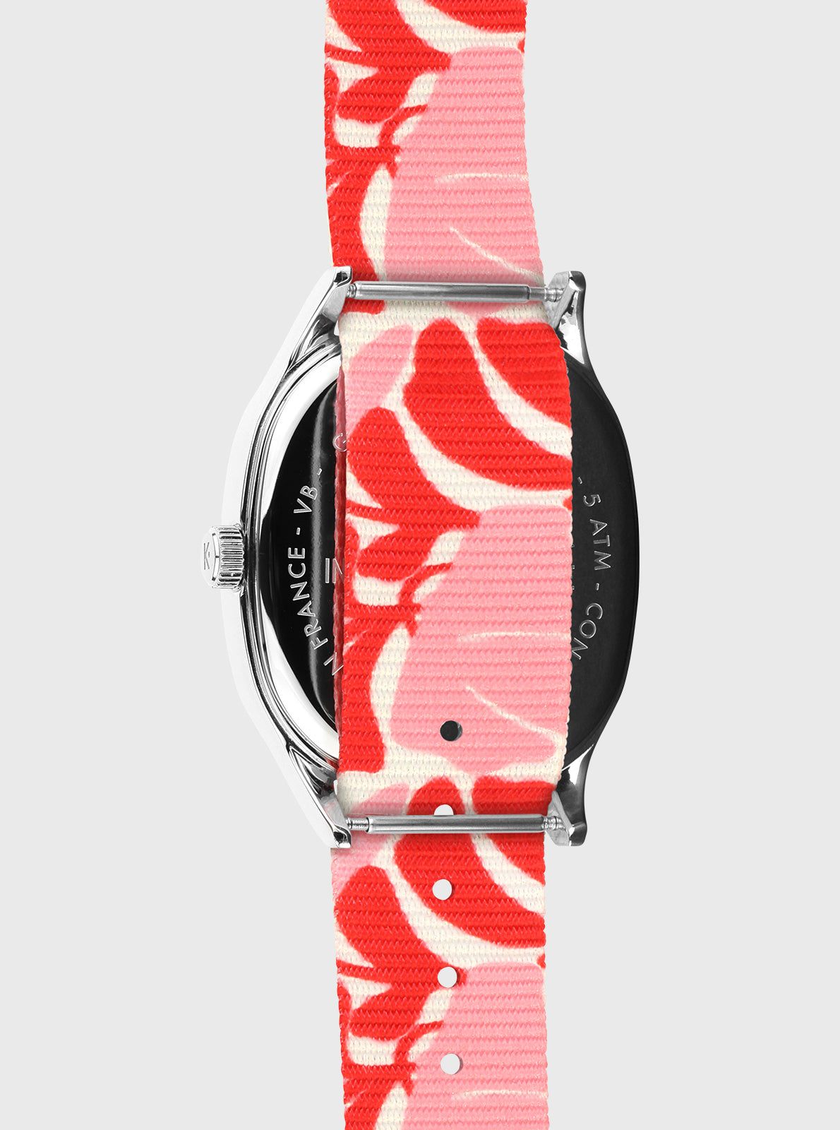 Image of Montre Kelton boîtier argent, fond noir, bracelet rose/rouge à motifs floraux