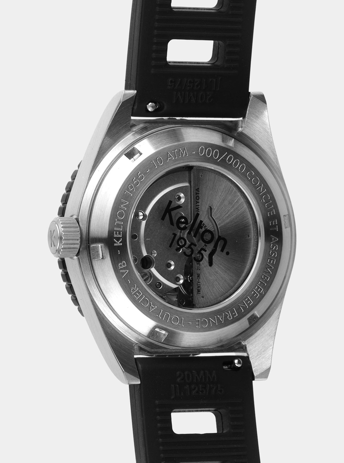 Image of Fond transparent de montre Kelton, mécanisme visible et marquages sur le boîtier argent