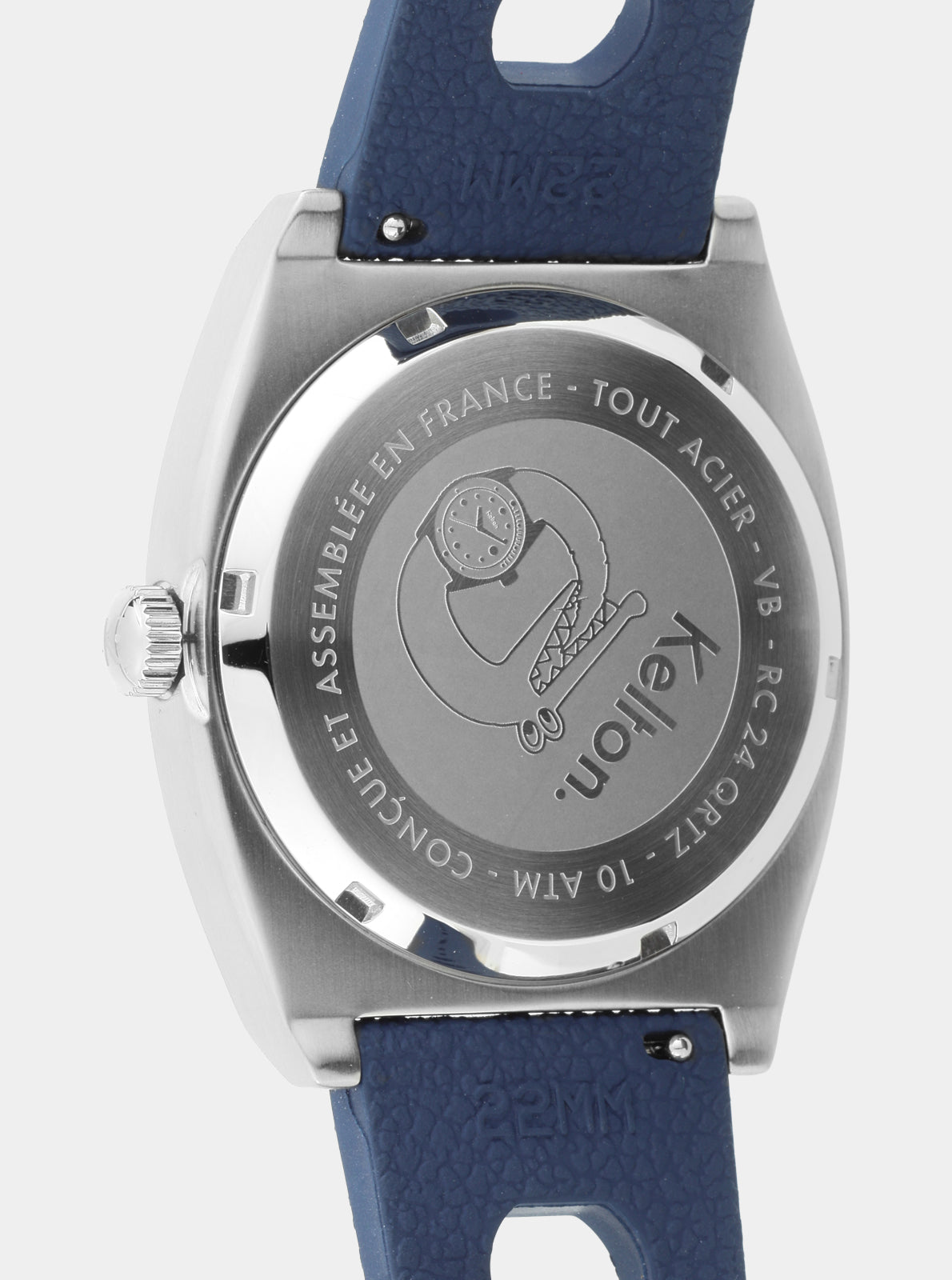 Image of Montre Kelton vue de dos : boîtier argenté gravé, bracelet cuir bleu