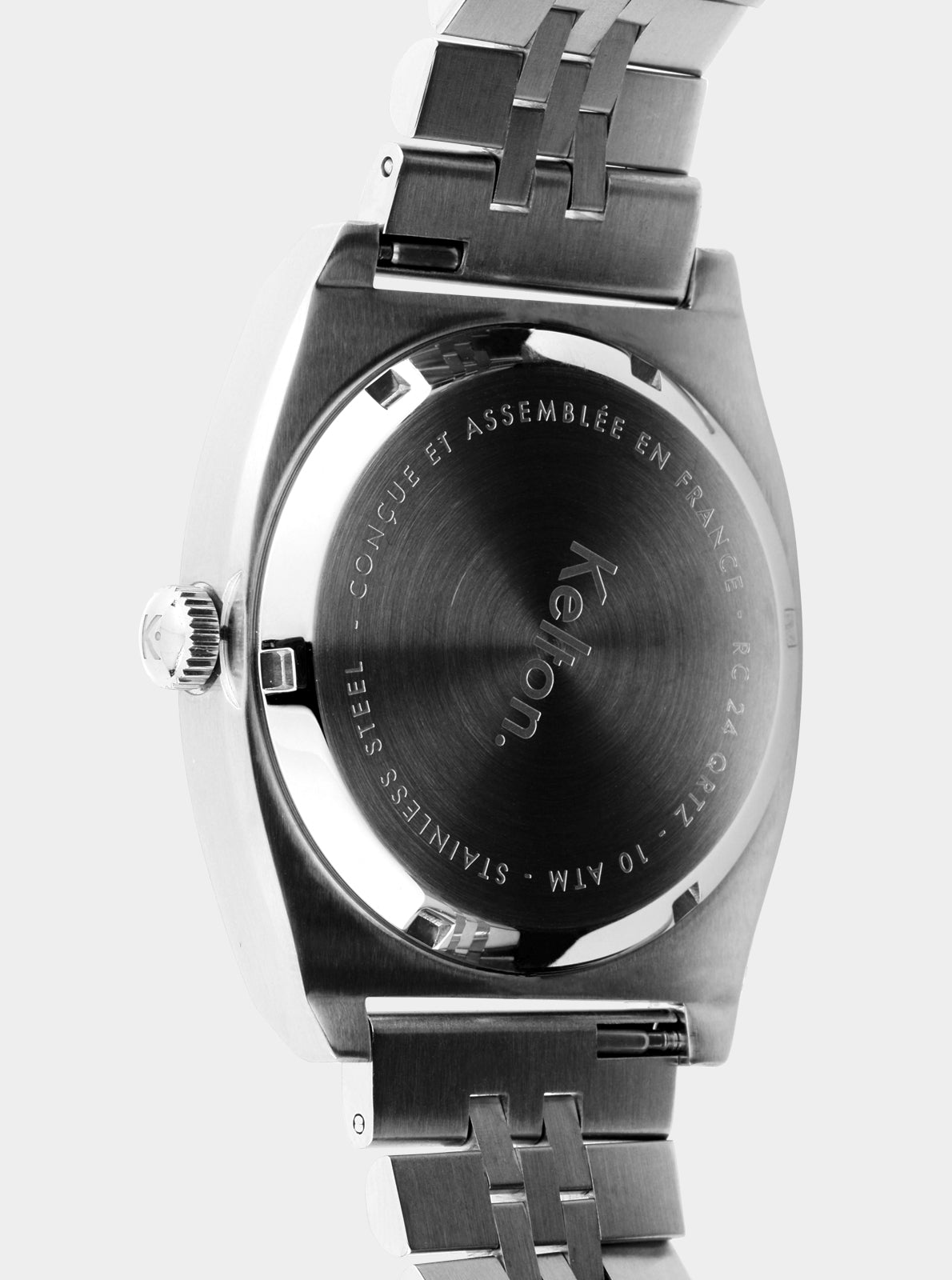 Image of Boîtier de montre quartz en acier avec inscription au fond, bracelet en acier.