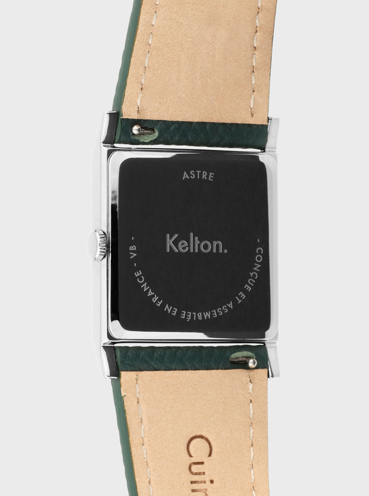 Image of Montre Astre avec fond noir, marquages KELTON et ASTRE, bracelet cuir vert.