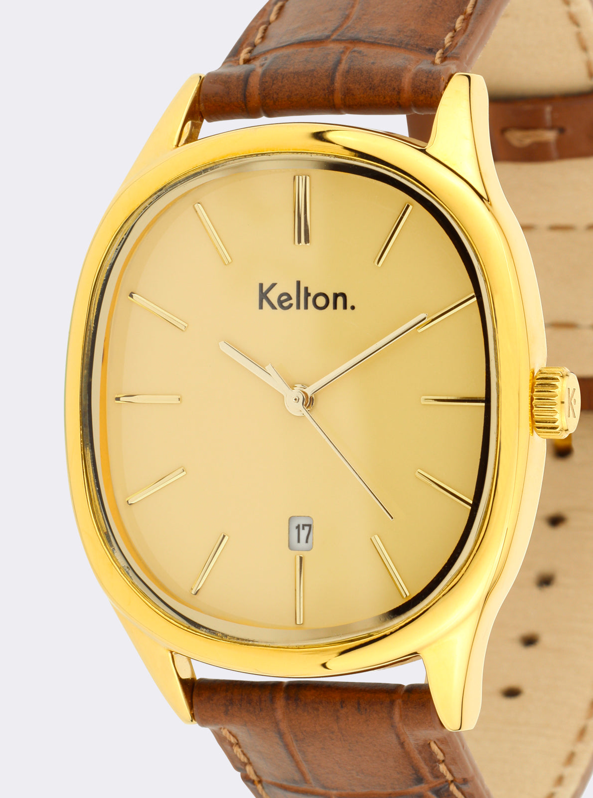 Image of Montre à cadran jaune doré, gros plan sur index, logo Kelton et date 17.