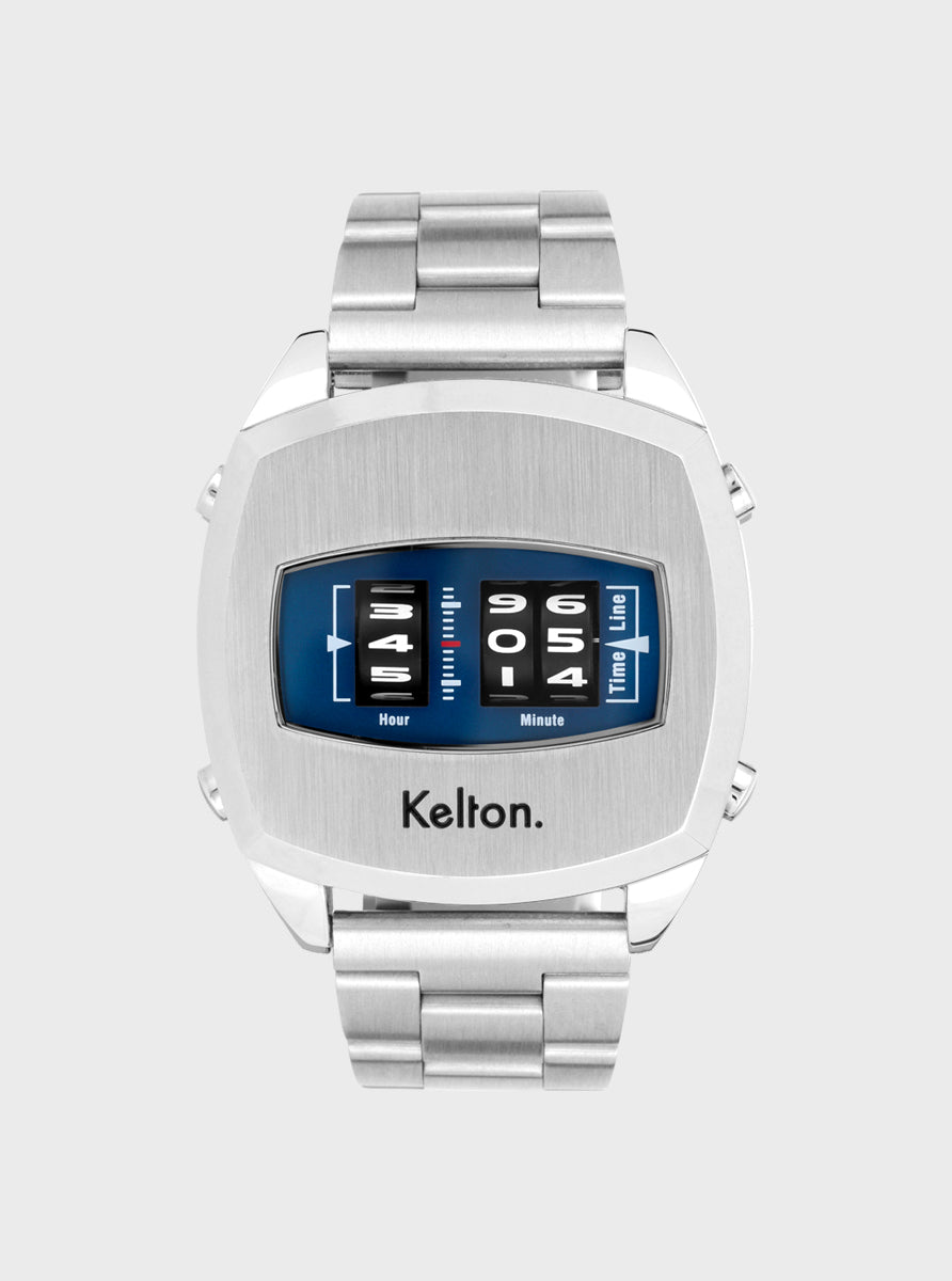 Image of Montre à bracelet métallique argenté, cadran bleu rectangulaire avec affichage numérique.
