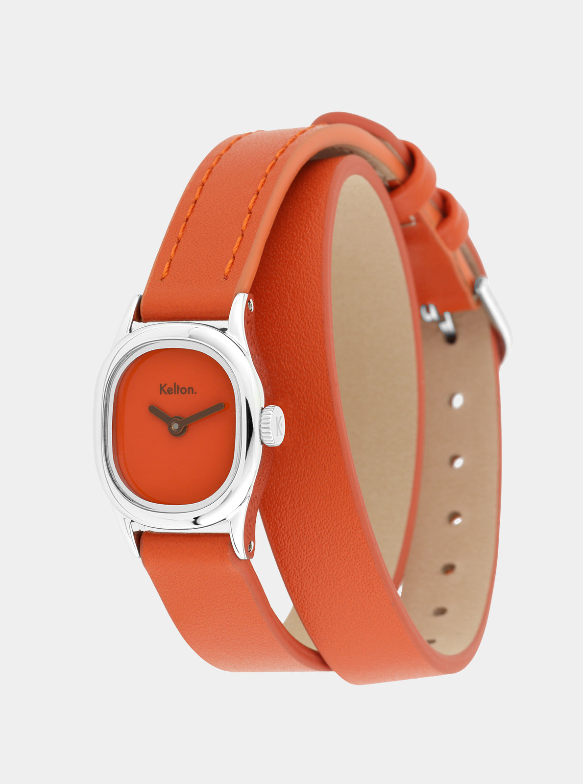 Image of Montre Kelton Minicolo avec bracelet cuir mandarine, boîtier argenté et couronne latérale.