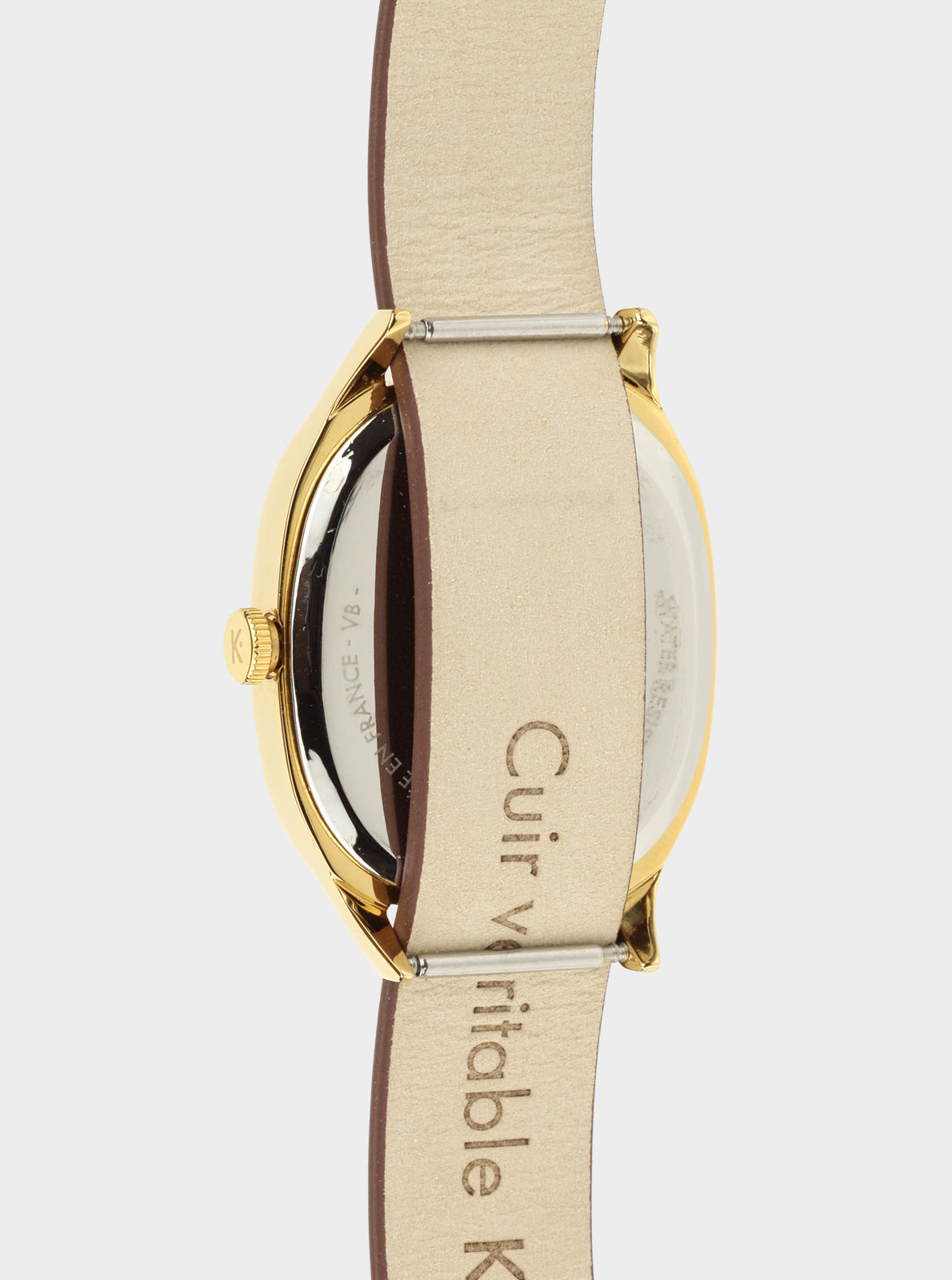 Image of Montre vue latérale, bracelet cuir brun et boîtier doré, fermoir visible