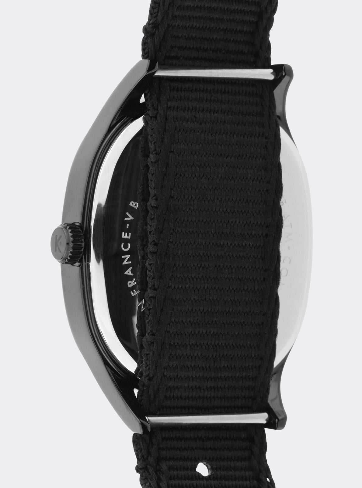 Image of Montre Kelton avec boîtier noir et bracelet textile noir, vue de côté avec couronne.