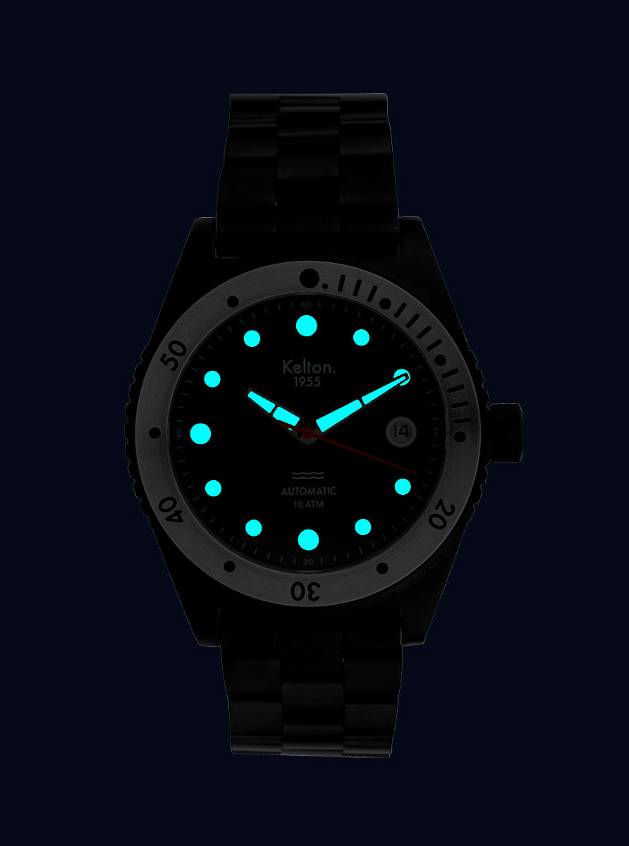 Image of Montre Kelton 1955 noire, cadran noir à points luminescents turquoise, bracelet métal