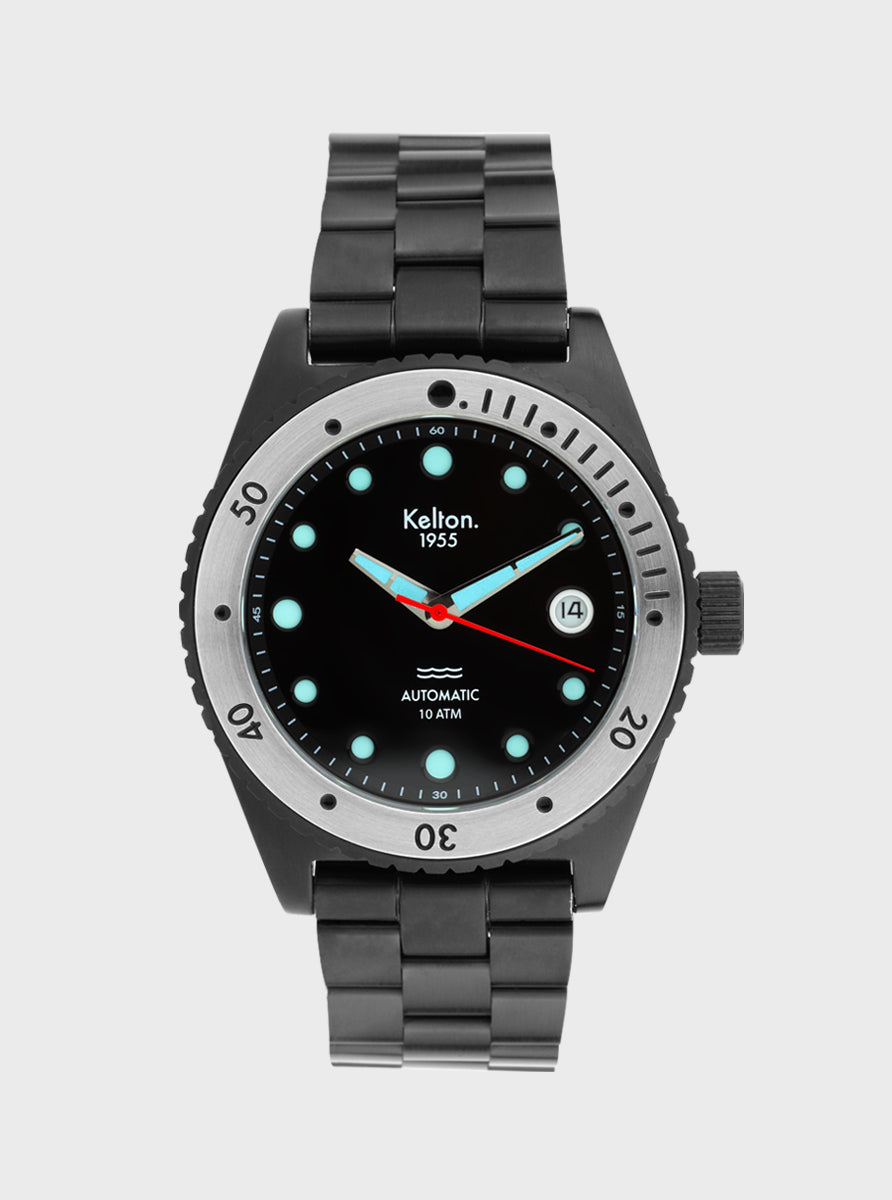 Image of Montre Kelton 1955 noire, cadran noir à index luminescents turquoise, bracelet métal