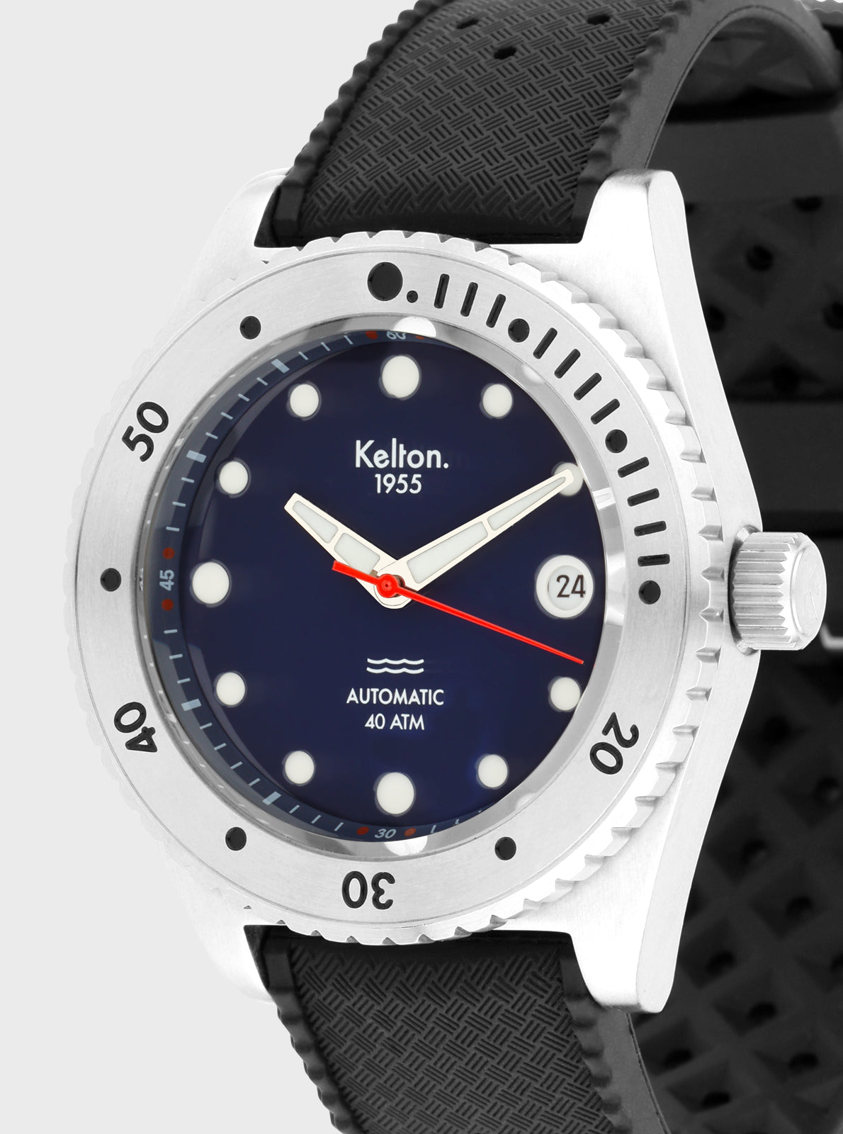 Image of Montre de plongée Kelton 1955, cadran bleu nuit, lunette blanche, bracelet noir.