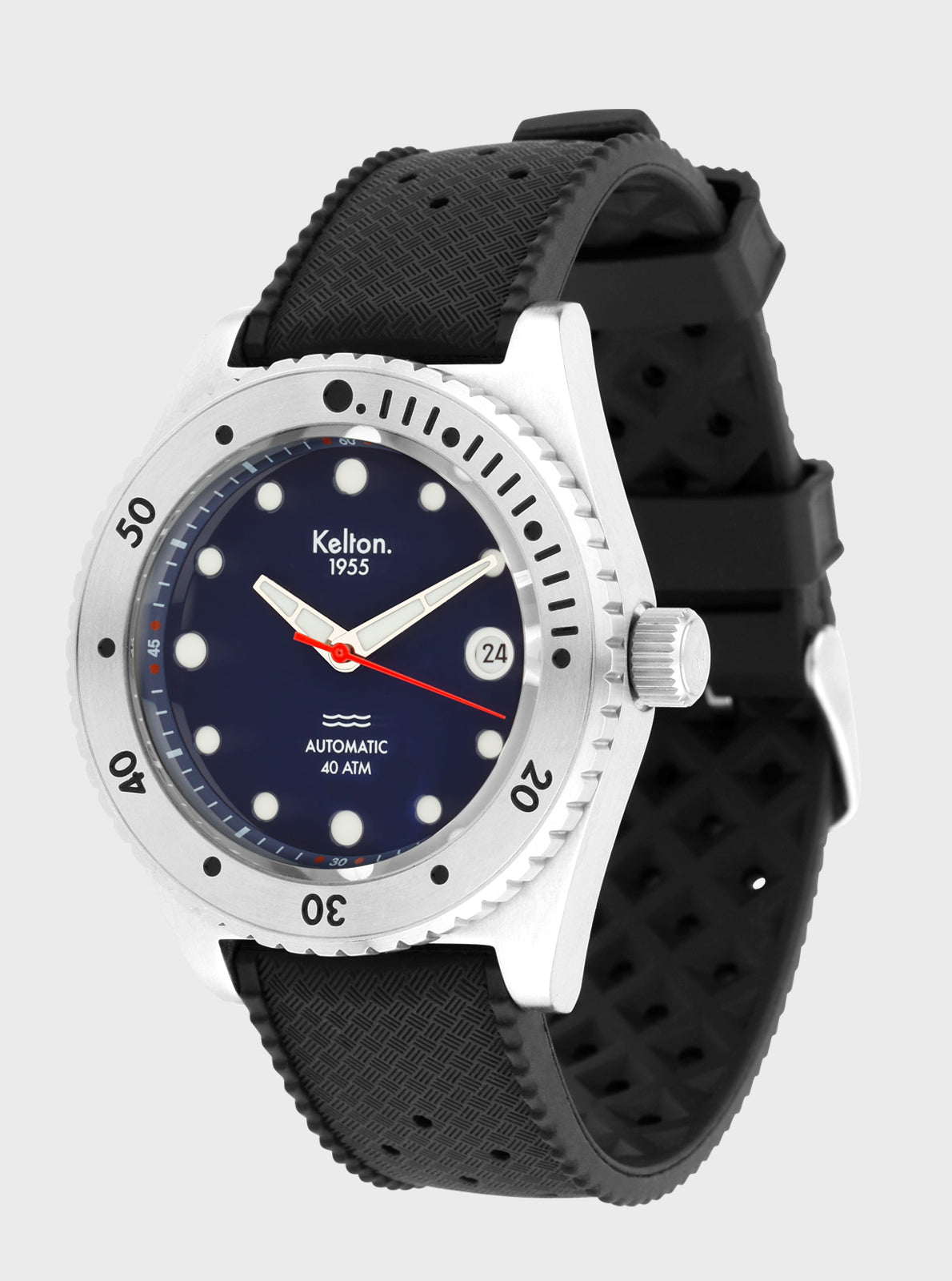Image of Montre de plongée Kelton 1955, boîtier blanc, cadran bleu nuit, bracelet noir texturé.