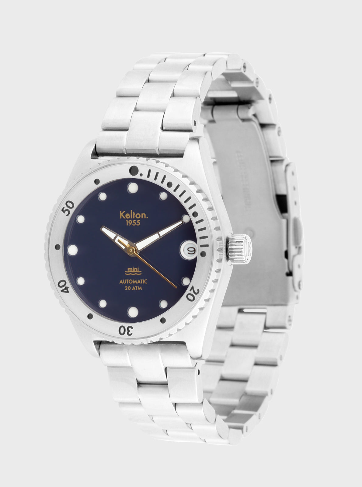 Image of Montre de plongée Mini : cadran bleu marine, lunette avec index, bracelet métallique.
