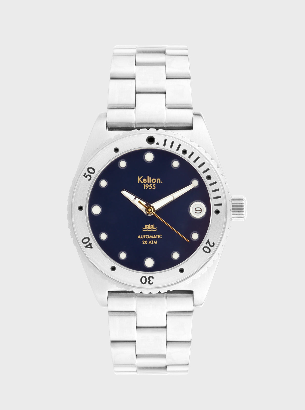 Image of Montre de plongée Mini : boîtier argenté, cadran bleu marine, bracelet métallique.