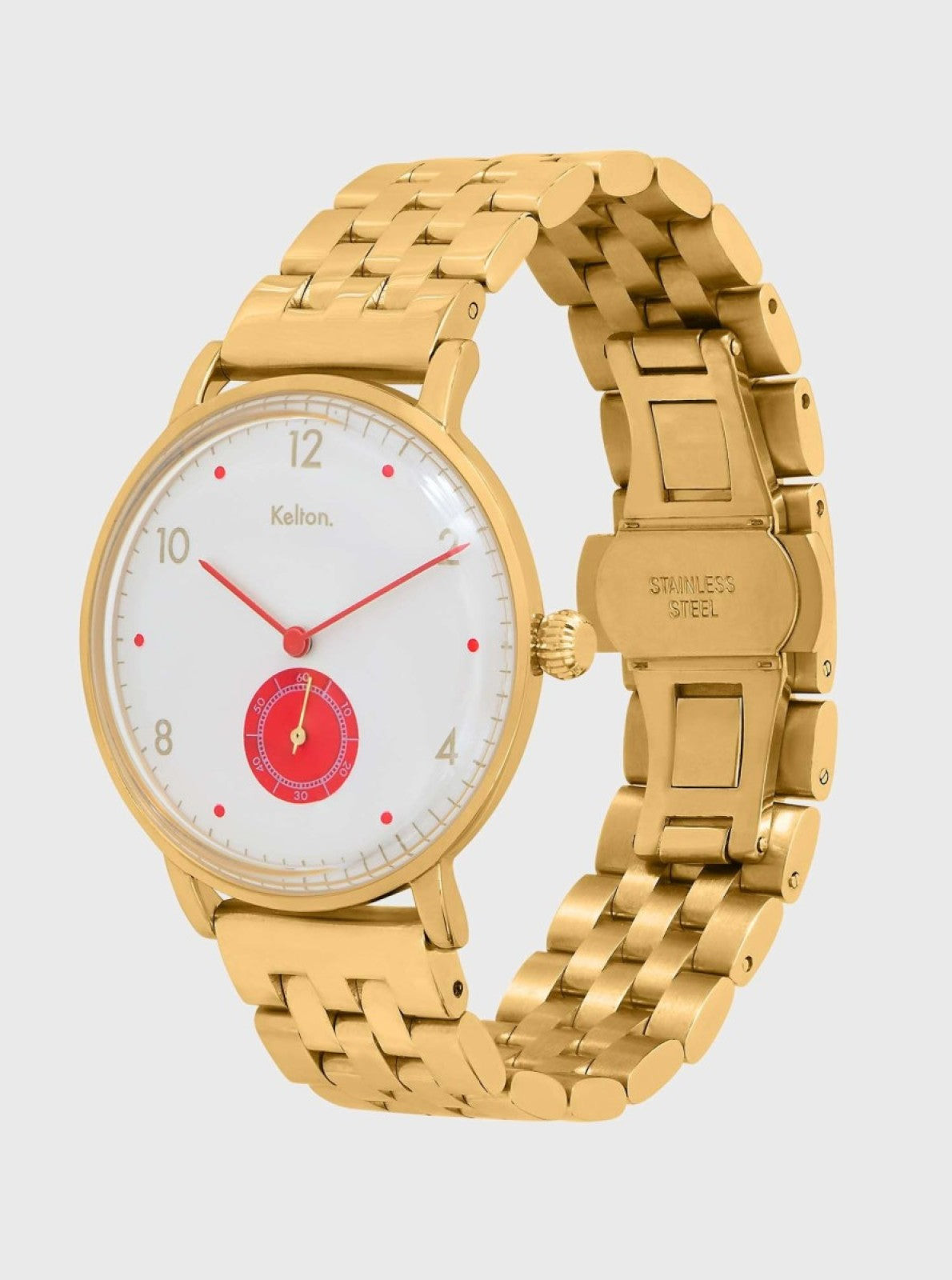 Image of Montre Villa dorée, cadran blanc à détails rouges, bracelet maille.