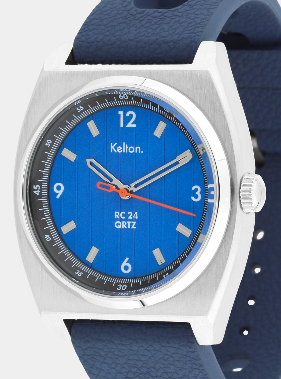 Close-up of RC24 Petroleum Quartz blue dial &ndash; blue Tropic Racing strap